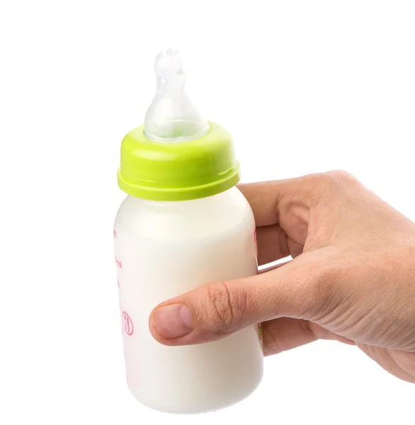 Babyflasche mit Milch halten — Stockfoto