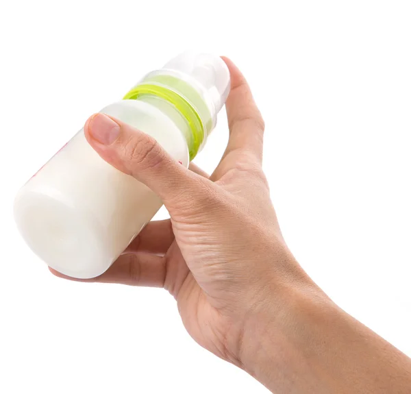 Babyflasche mit Milch halten — Stockfoto