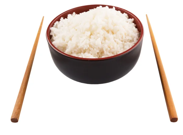 Чаша риса и палочка для еды — стоковое фото