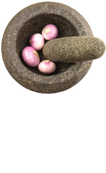 Kamenné moždíř s cibulí — Stock fotografie