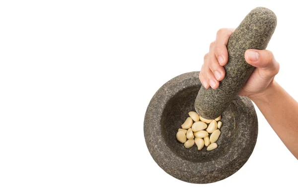 Crunching Garlics Using Stone Pestle And Mortar — Stock Photo, Image