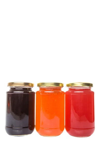 Bosbessen Aardbeien Oranje Vruchten Gebotteld Jam Witte Achtergrond — Stockfoto