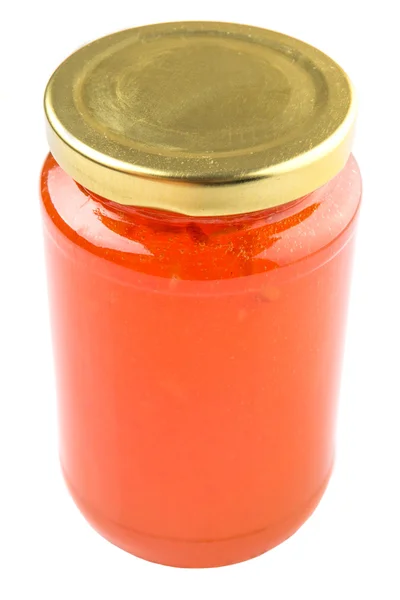 Oranje vruchten jam in een fles — Stockfoto