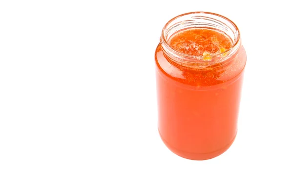 Marmellata Frutta Arancione Una Bottiglia Sfondo Bianco — Foto Stock
