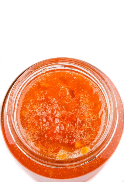 Marmellata di frutta arancione in una bottiglia — Foto Stock