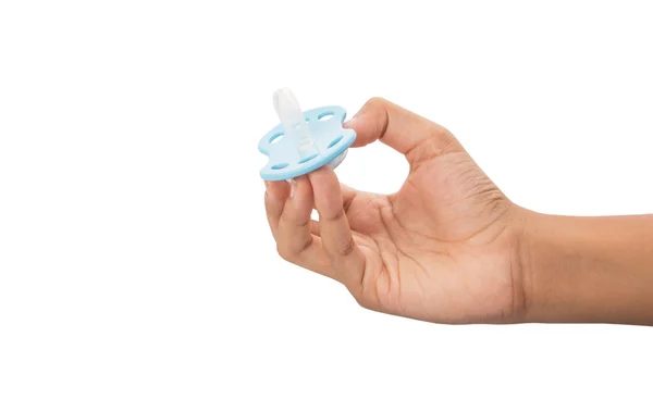 Female Hand Holding Blue Pacifier — Stock Photo, Image