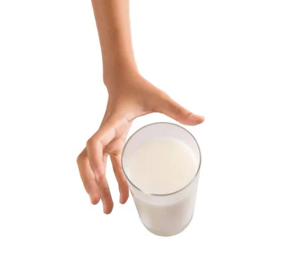 ミルクのガラスを持つ若い女の子の手 — ストック写真