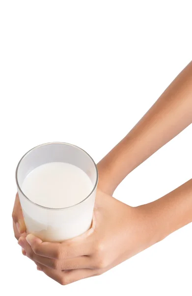 Jong meisje hand met een glas melk — Stockfoto