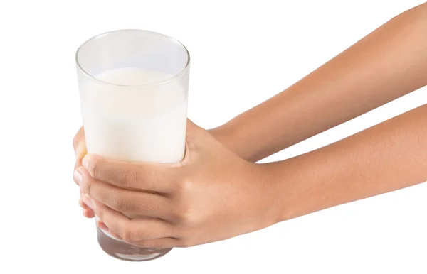 Jovem mão menina com um copo de leite — Fotografia de Stock
