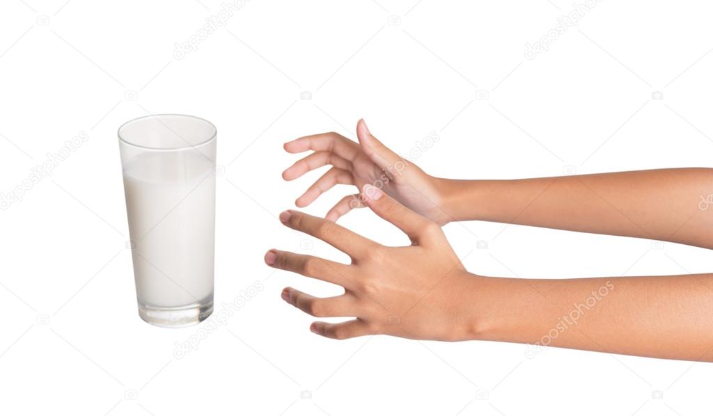 Young Girl Hand With A Glass Of Milk