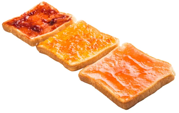 Mescolare la marmellata di frutta spalmata sul pane tostato — Foto Stock