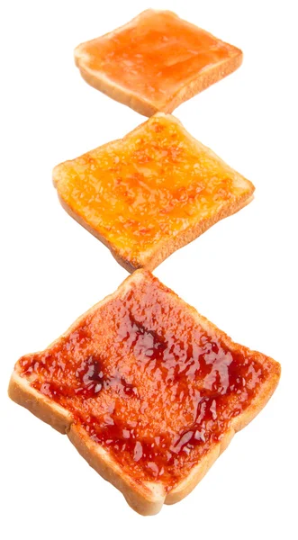Mescolare la marmellata di frutta spalmata sul pane tostato — Foto Stock