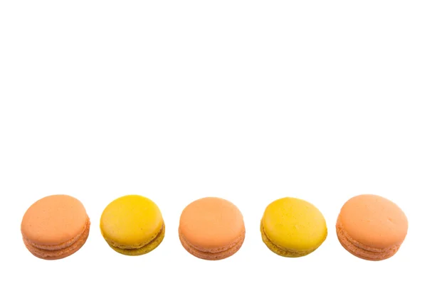 Macaron francesi colorati gialli e arancioni — Foto Stock