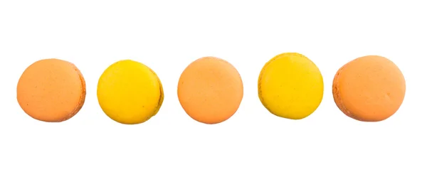 Gelbe und orangefarbene französische Macarons — Stockfoto