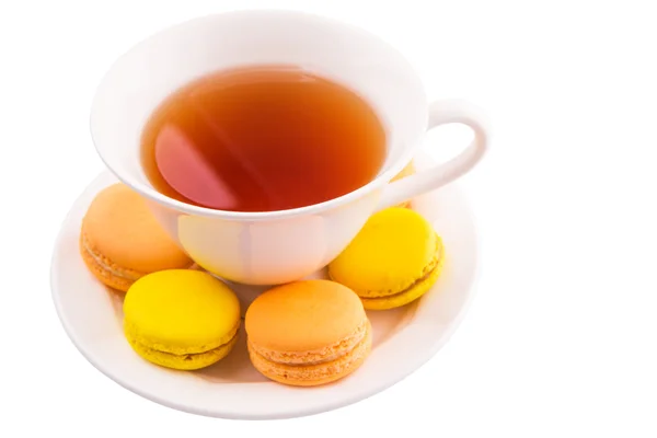 Cup Tea Yellow Orange Colored Macarons White Background — Stock Photo, Image