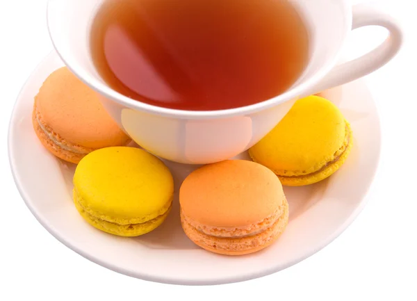 Cup Tea Yellow Orange Colored Macarons White Background — Stock Photo, Image