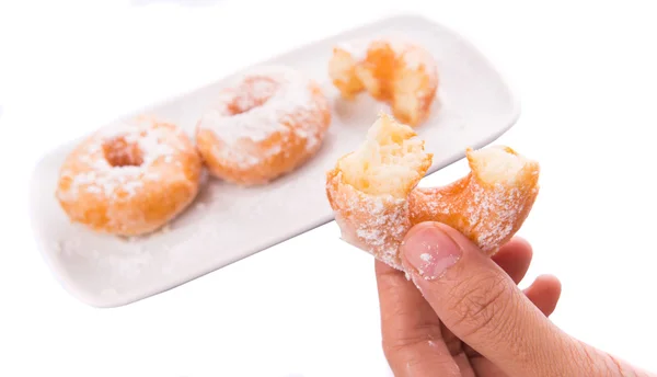 Weibchen mit Krapfen — Stockfoto