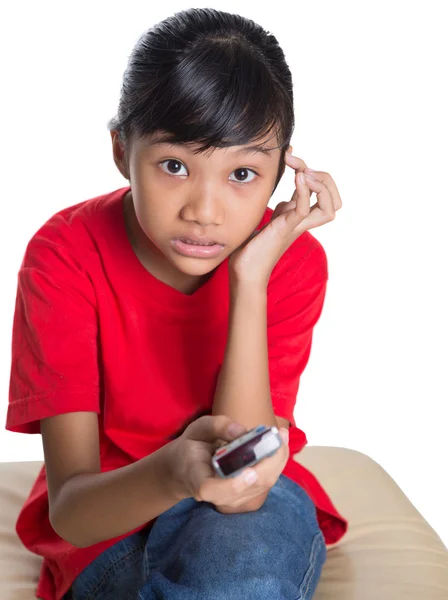 Young Asian Girl With Television Remote Device — Stock Photo, Image