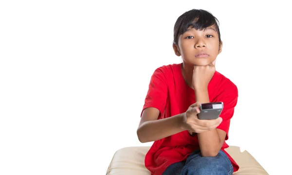 Young Asian Girl With Television Remote Control — Stock Photo, Image