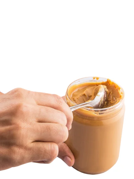 Weibliche Hand mit Erdnussbutter — Stockfoto