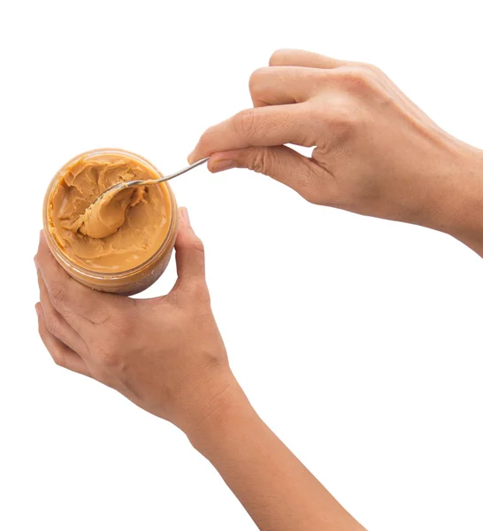 Weibliche Hand mit Erdnussbutter — Stockfoto