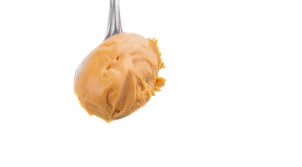 Mantequilla de cacahuete con cuchara pequeña —  Fotos de Stock