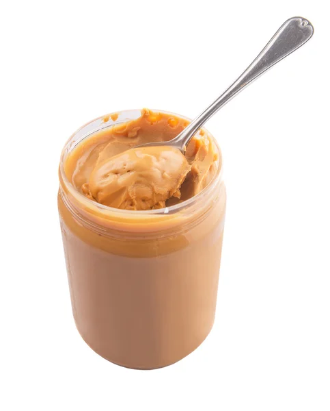Mantequilla de cacahuete con cuchara pequeña —  Fotos de Stock