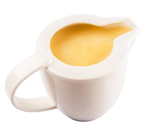 Gecondenseerde Melk Een Kleine Melkkannetje Witte Achtergrond — Stockfoto