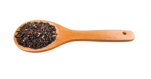 Černá Lepkavá Rýže Dřevěnou Lžící Nad Bílým Pozadím — Stock fotografie