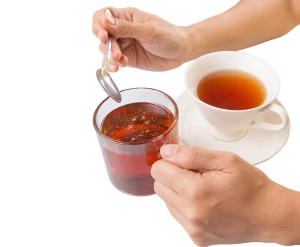 Female Hand Mixing Honey With Tea — Stock Photo, Image