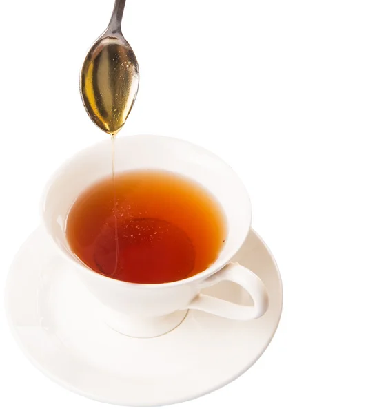 Mixing Honey With Tea — Stock Photo, Image