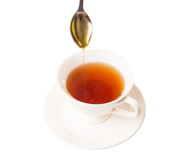 Míchání medu s čajem — Stock fotografie