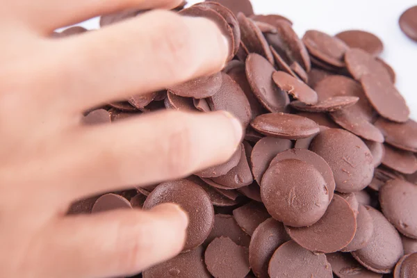 Vista Cercana Mano Recogiendo Botón Chocolate — Foto de Stock