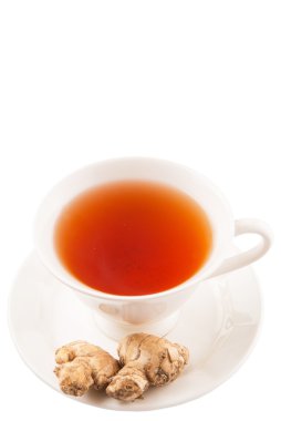 bir fincan çay ve zencefil kökü
