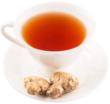 bir fincan çay ve zencefil kökü
