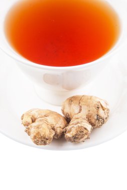 bir fincan çay ve zencefil kökü