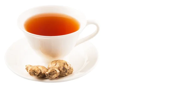 Корень имбиря и чашку чая — стоковое фото