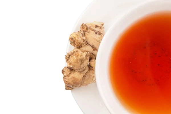 Raíz de jengibre y una taza de té — Foto de Stock