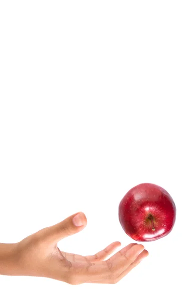 Sáhl po červené jablko — Stock fotografie