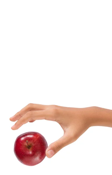 Mädchenhände Greifen Nach Einem Roten Apfel Vor Weißem Hintergrund — Stockfoto