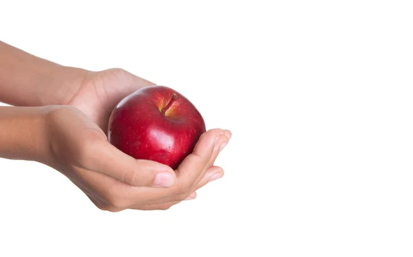 In der Hand einen roten Apfel — Stockfoto