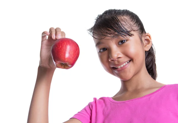Giovane ragazza con una mela rossa — Foto Stock