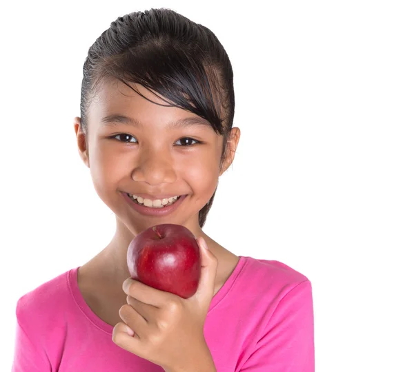 Junges Mädchen mit einem roten Apfel — Stockfoto