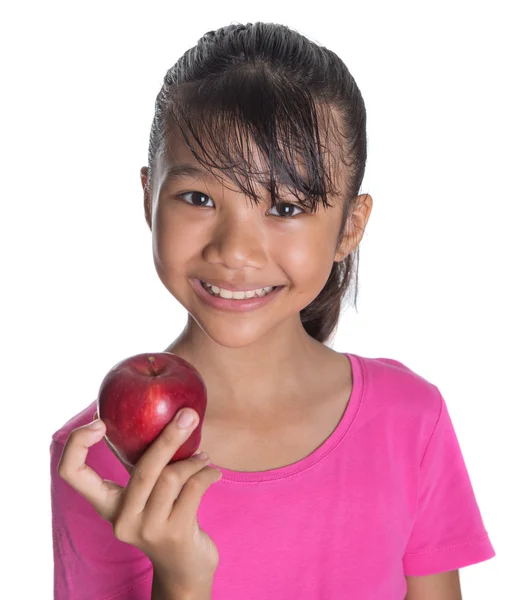 若い女の子がアップルを食べて — ストック写真