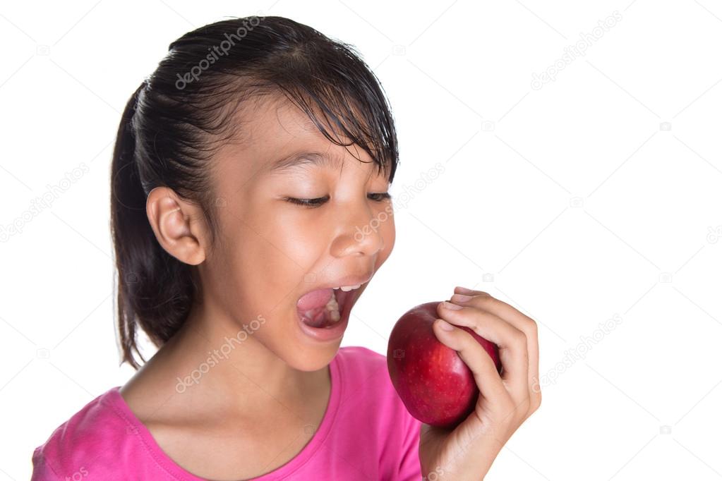 Young Girl Eating Apple