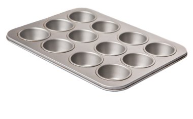 Cupcake ve beyaz zemin üzerine çörek tepsisi