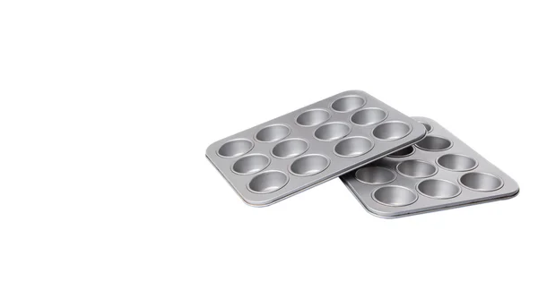 Cupcake and muffin pans — Stock Photo, Image