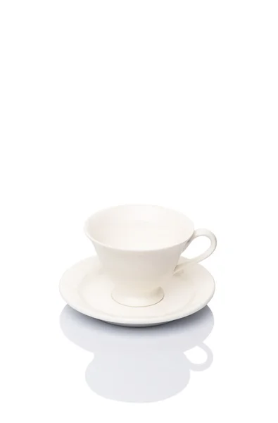 Platillo de cerámica y taza de té — Foto de Stock