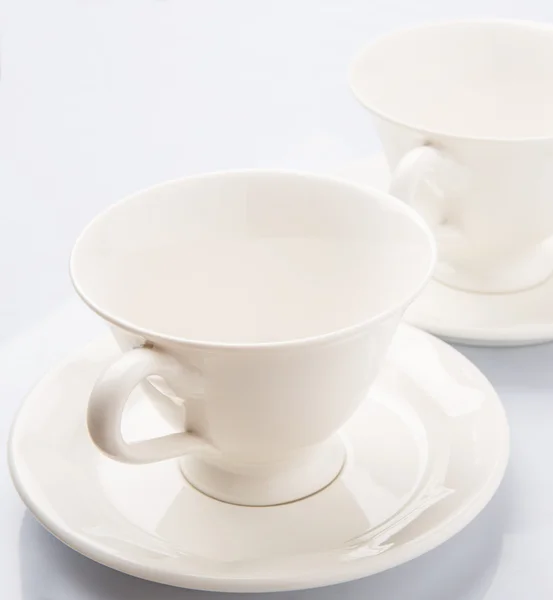 Platillos y tazas de té de cerámica — Foto de Stock