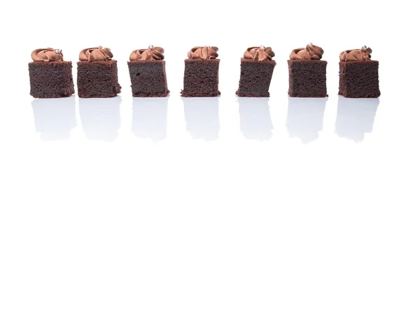 Bite Sized Chocolate Cakes Icing Top White Background — Stock Photo, Image